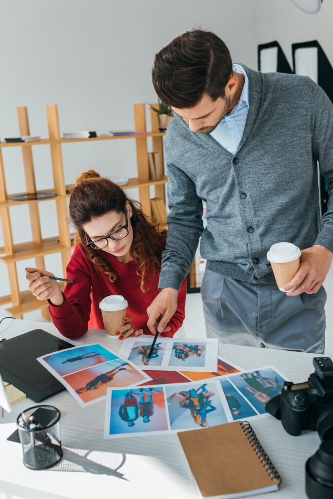 female and male designers looking on photos in mod 2024 11 17 18 18 11 utc